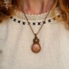 fossilized coral prehnite macrame necklace wearing